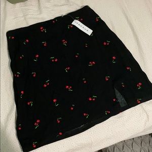 Lottie Moss cherry print mini skirt